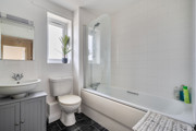 Contemporary family bathroom with bath and shower