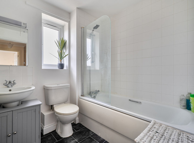 Contemporary family bathroom with bath and shower