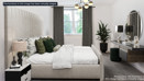 Stylish double bedroom with contemporary furnishings, green accents, and a calming neutral colour palette.