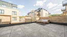 Terrace with paved flooring and outdoor seating area.