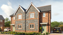 Plots 41 & 52, two semi-detached houses with flint detail and brickwork to the front and driveways either side.
