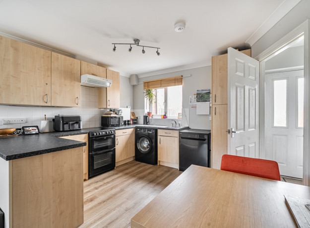 Modern fitted kitchen in two-bedroom terraced home