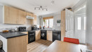 Modern fitted kitchen in two-bedroom terraced home