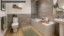 Bathroom at Brickmark Place with modern fittings, bath and shower, vanity unit, and tiled walls.