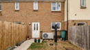 Enclosed rear garden with patio area at terraced property