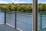 Waterside Balcony Overlooking Lake And Greenery At Herons Lake
