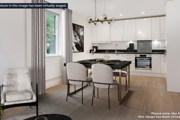 Modern open-plan kitchen and dining space with breakfast bar seating, integrated appliances, and contemporary finishes.