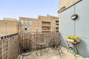 Private balcony with seating.