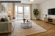Living room at Brickmark Place featuring contemporary furnishings, neutral tones, and a large window.